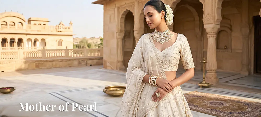 Woman in traditional attire with Mother of Pearl